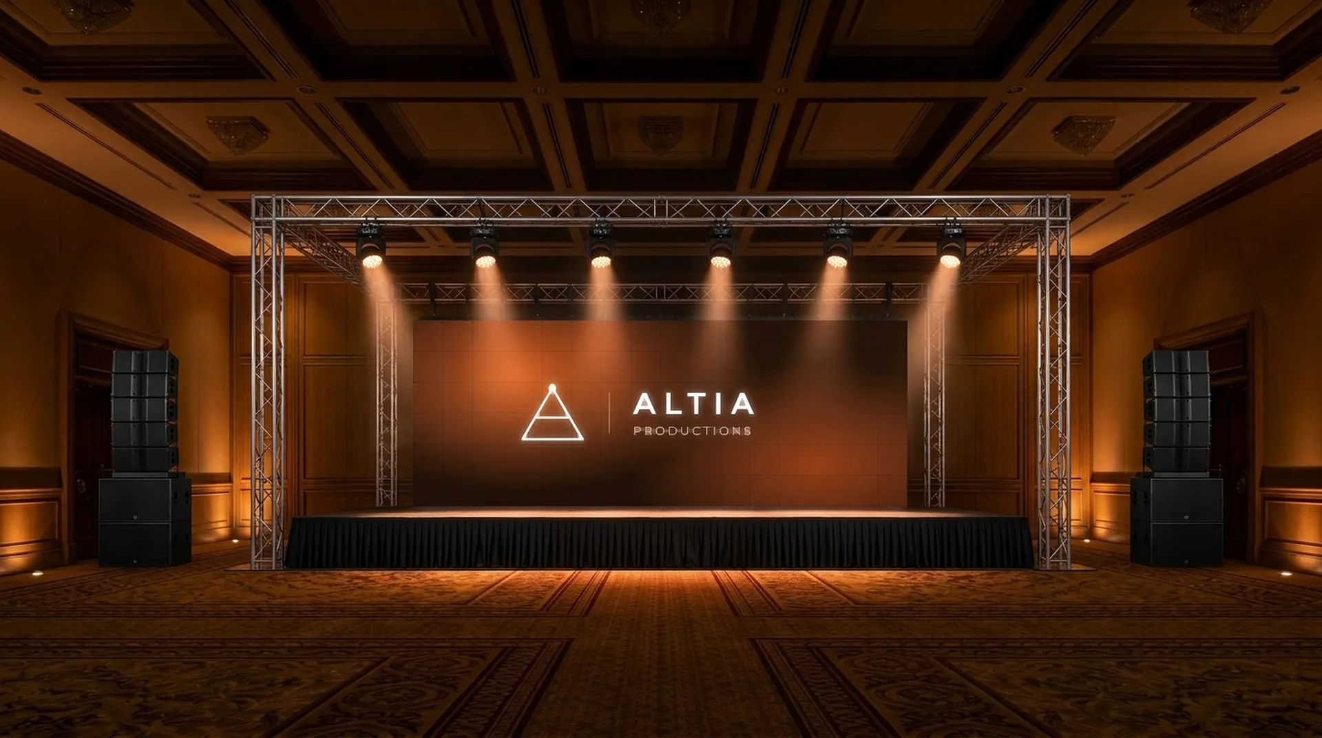 El mismo salón con escenario, estructura de truss, pantalla LED y audio instalados